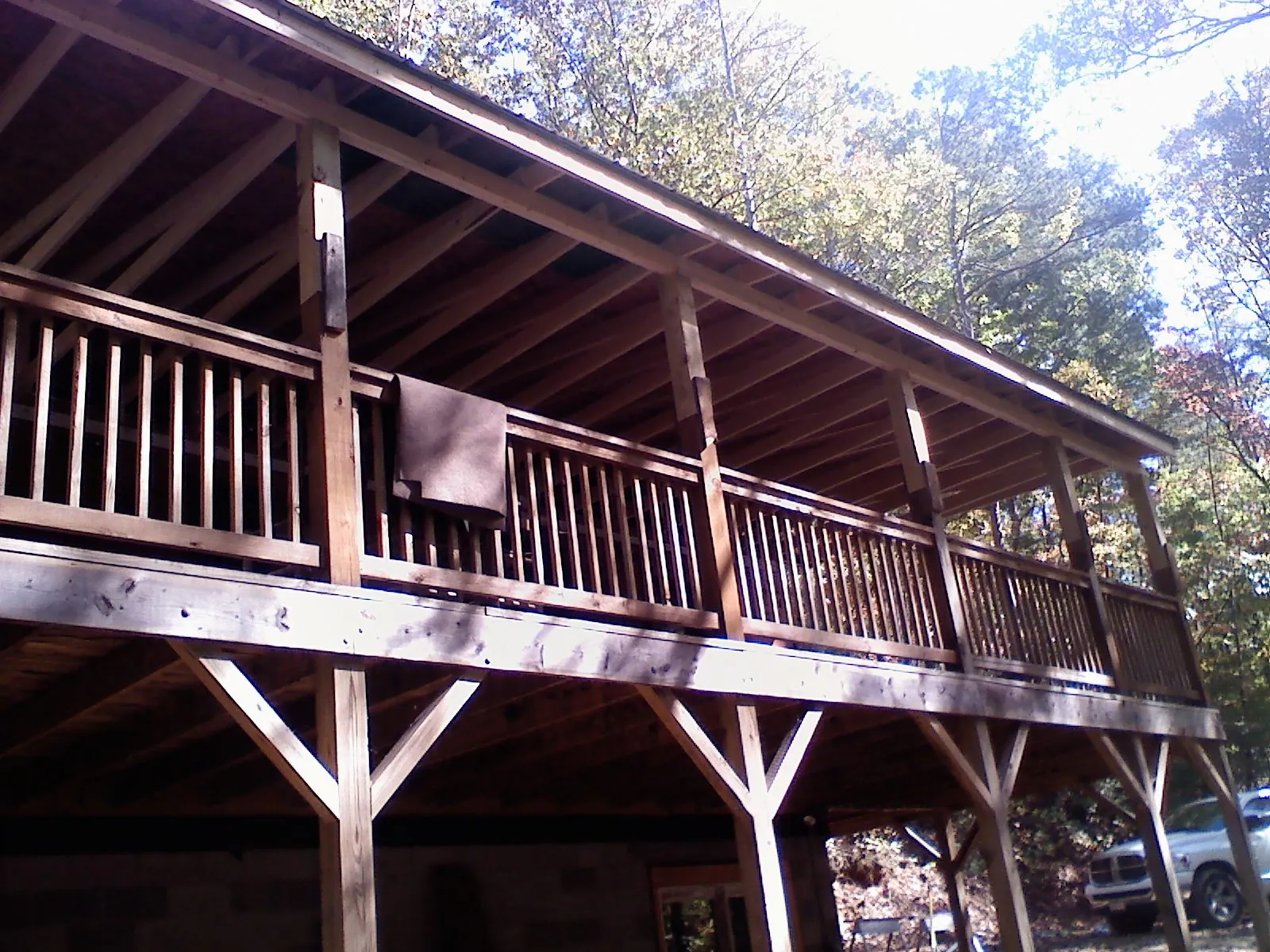 Timber framing under a new elevated porch and deck — Roof Leak Repair in Egg Harbor by Roofing Brothers